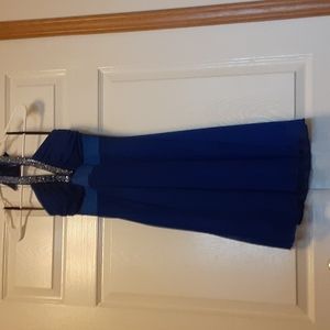A dark blue dress it is missing a couple gems at the top but not noticeable